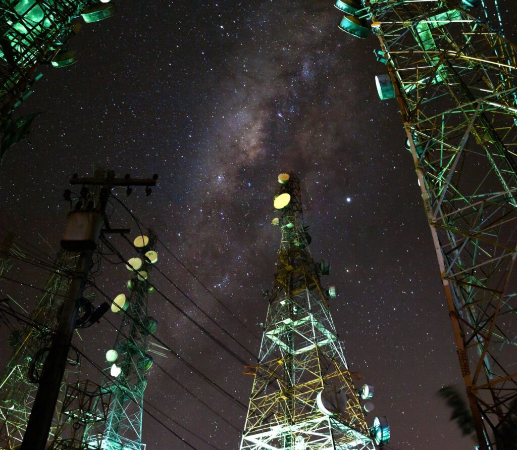 Communication towers under the starry sky in Paraíba, Brazil showcasing the Milky Way.